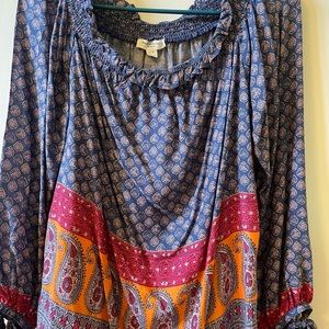 Beachlunchlounge blue print blouse with orange and paisley accents.